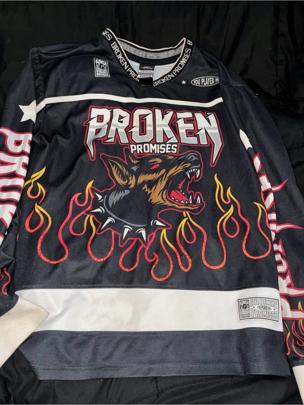Broken Promises Men’s Black Graphic Hockey Jersey with Flame Dog Motif